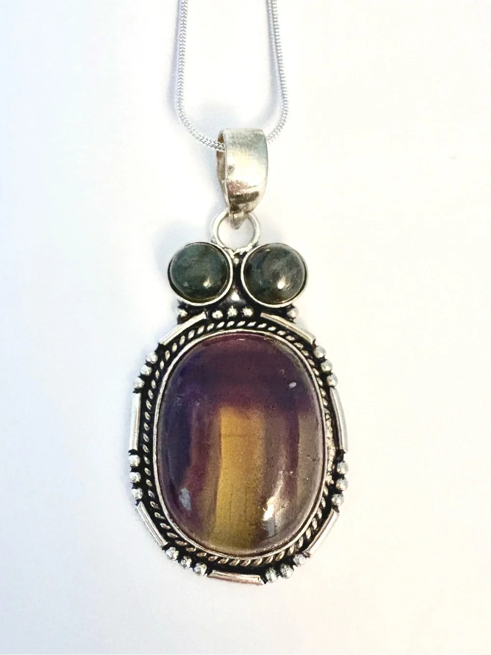 Beautiful 2 inch,925 marked, Fluorite and  Labradorite pendant on a silver chain